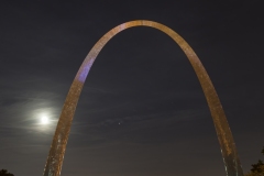 Moon rising to side of Arch